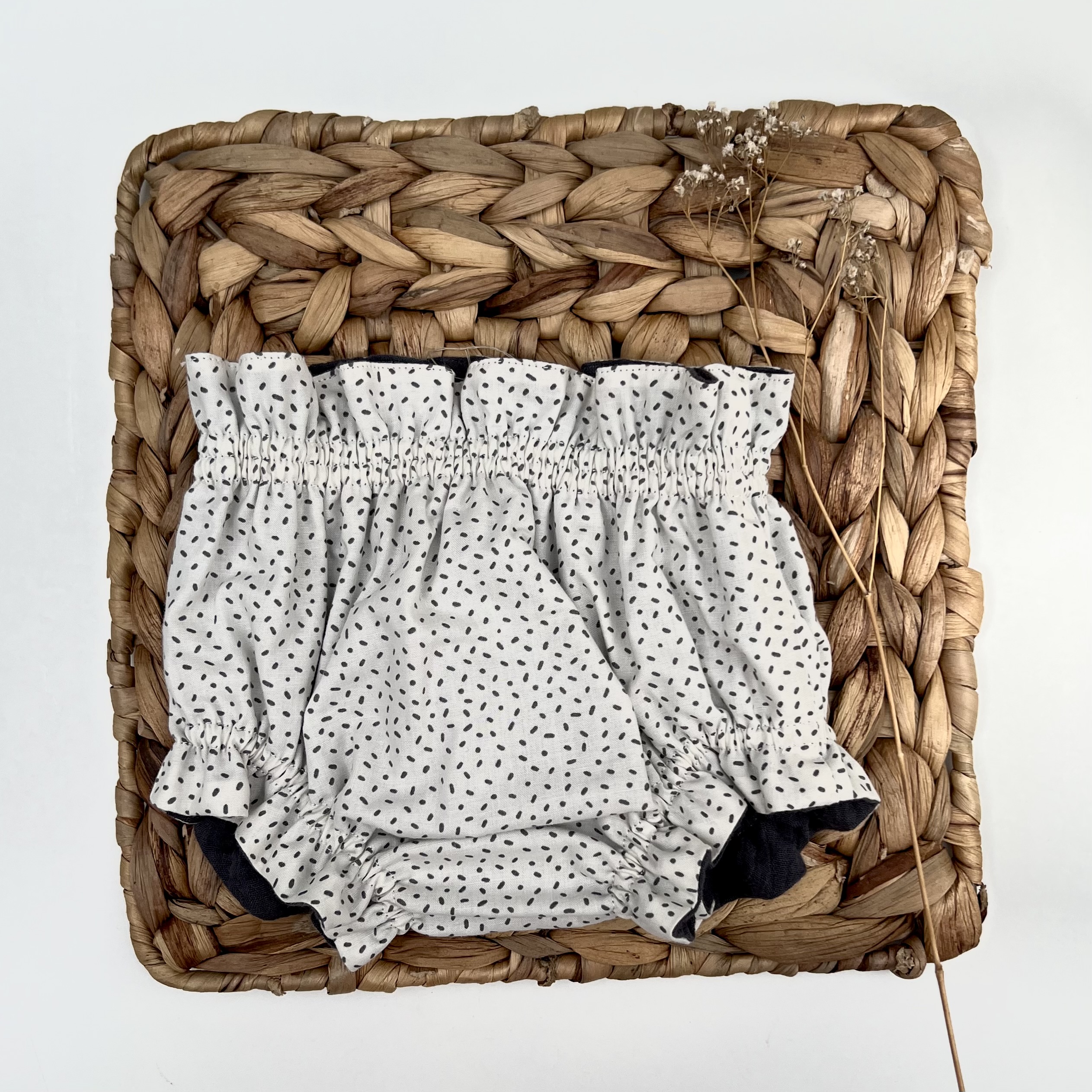 cubrepañal reversible gris
